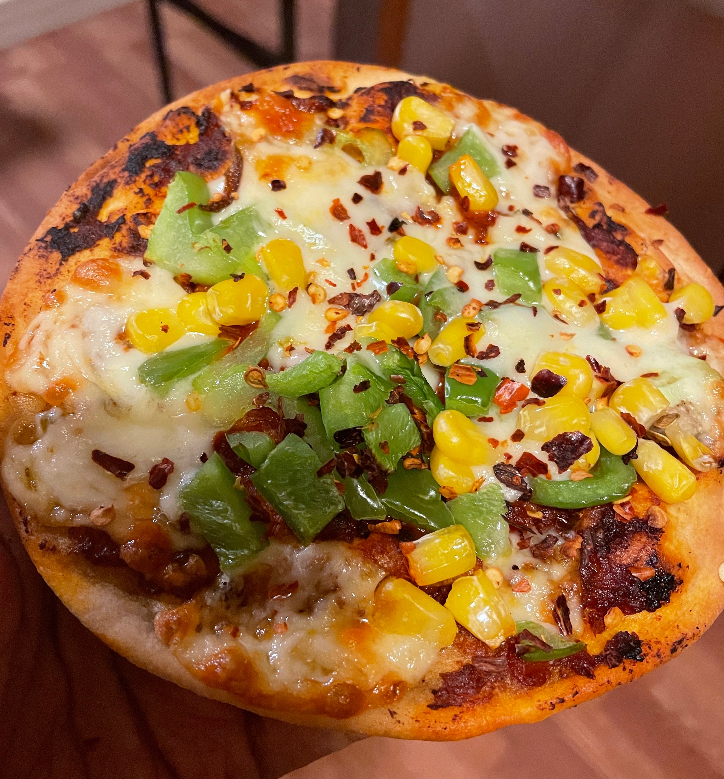 Pizza made in an Indian style with Naan